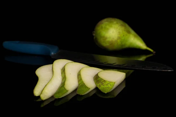 Fresh green pear isolated on black glass — Stock Photo, Image