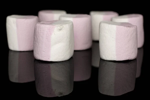 Sweet pastel marshmallow isolated on black glass — Stock Photo, Image