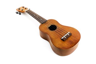 Beyaz arka plan üzerinde kahverengi ukulele,