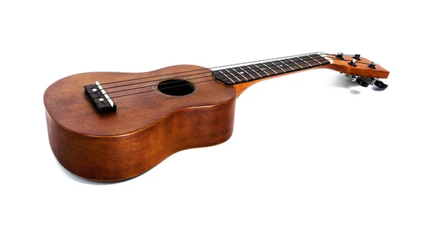 O ukulele marrom no fundo branco, com caminho Clipping — Fotografia de Stock