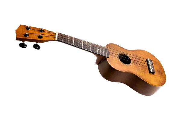 Den bruna ukulele på den vita bakgrunden, med urklippsbana — Stockfoto