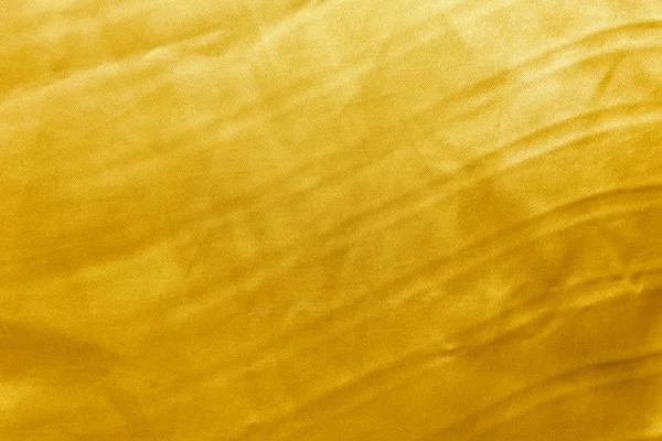 Stoff Gold Hintergrund oder Textur und Steigungen Schatten, Design-Muster Kunstwerk. — Stockfoto