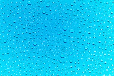 Mavi arka planda su damlaları, tasarım ve desen arka planı için