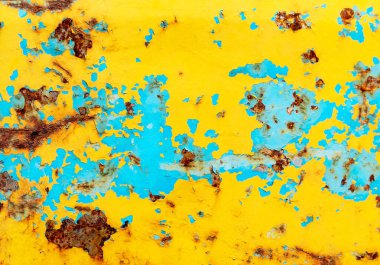 Seçici odak paslı metal plaka veya eski metal, arka plan için sarı ve Mavi çelik metal pas dokusu. Boş kopya alanı