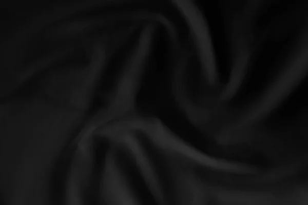 Abstrakt svart tyg textur bakgrund, lyx trasa eller flytande våg — Stockfoto