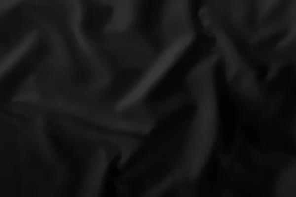 Abstrakt svart tyg textur bakgrund, lyx trasa eller flytande våg — Stockfoto
