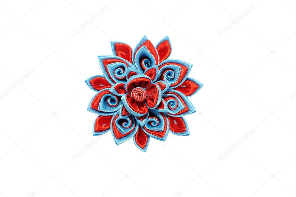 Kanzashi. Red blue artificial flower isolated on white backgroun