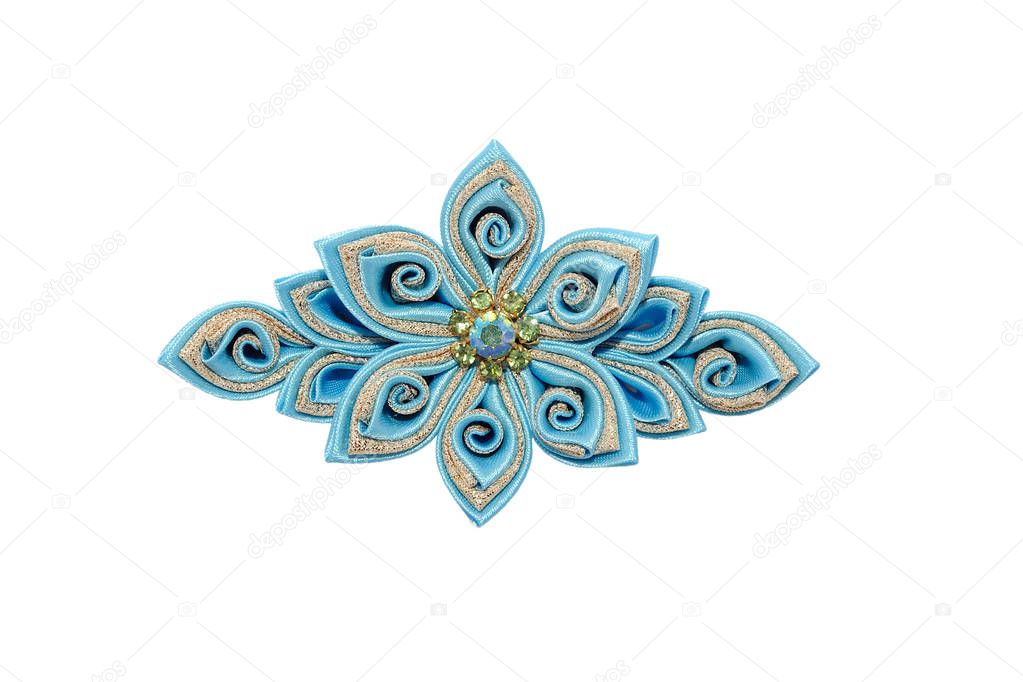 Kanzashi. Blue artificial flower isolated on white background
