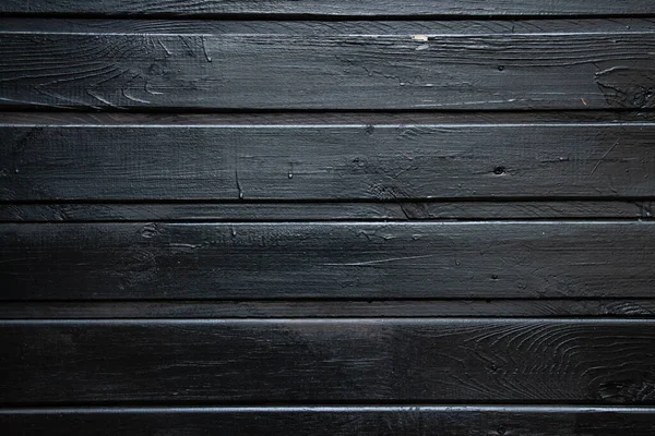 Achtergrond van parallelle houten planken, zwarte kleur, kopieerruimte — Stockfoto
