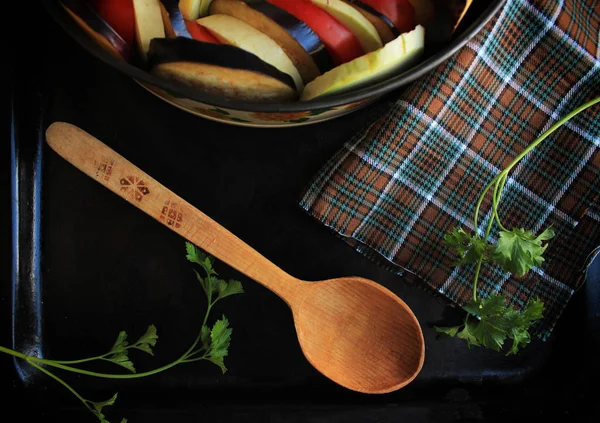 Famous French country food - ratatouille cooked in nouvelle cuisine style. Ratatouille - french vegetarian dish made of zucchini, eggplants, peppers, onions, garlic and tomatoes with aromatic herbs.