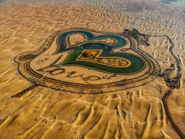 Aerial View of entire Love Lake Dubai at Al Qudra. A new tourist destination in the vicinity of Al Qudra Lakes Dubai. Love Lake is one of the major tourist attraction in Dubai.