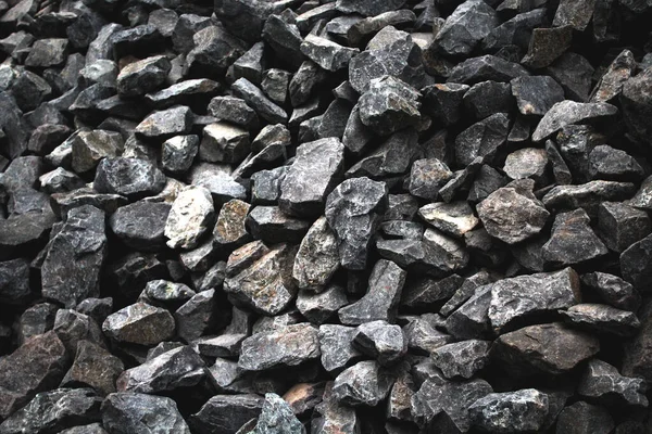 Gri taşların soyut dokulu arka planı