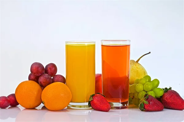 White Table Glasses Orange Grape Juice Various Fruits Color Photo — Stock Photo, Image