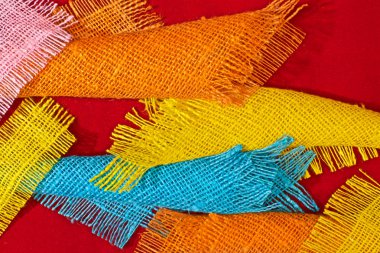 Soyut çok renkli güzel arka plan, pamuk kaba kumaş parçalarından yapılmış.