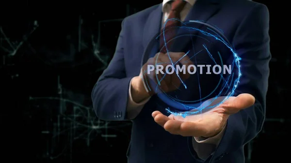 Businessman shows concept hologram Promotion on his hand — Stock Photo, Image