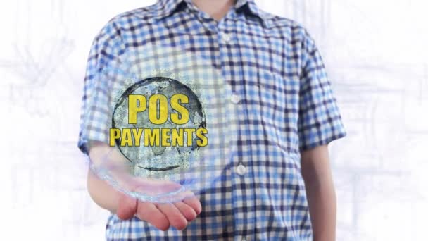 Anak muda menunjukkan hologram dari planet Bumi dan teks POS Payments — Stok Video