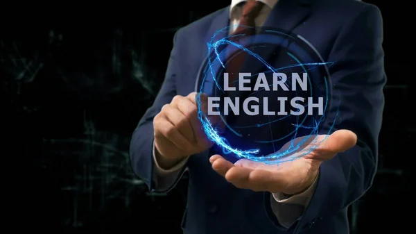 Imprenditore mostra concetto ologramma Impara l'inglese sulla sua mano — Foto Stock