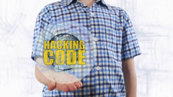 Молодий чоловік показує голограму планети Земля і текст Хакерський код — стокове фото