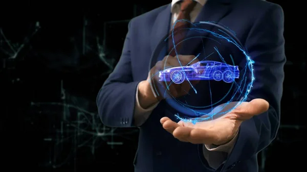 İşadamı kavramı hologram araba elini üzerinde gösterir.
