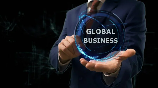 Empresario muestra concepto holograma Global Business en su mano — Foto de Stock