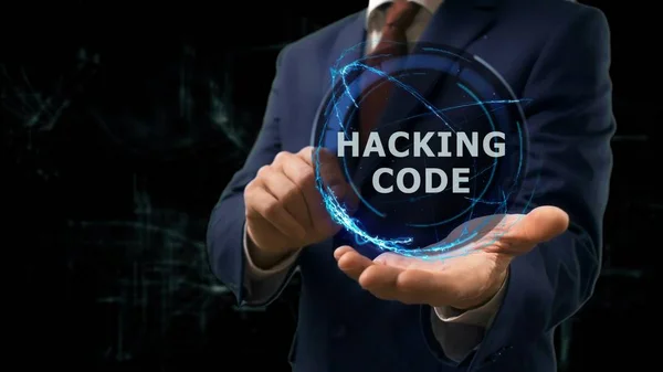 Podnikatel ukazuje koncept hologram Hacking kód na ruce Royalty Free Stock Fotografie
