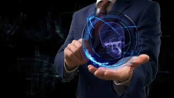 Empresário mostra conceito holograma 3d crânio em sua mão — Fotografia de Stock