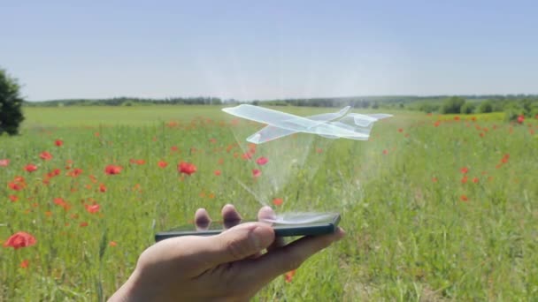 Hologramm des Business-Jets auf dem Smartphone — Stockvideo