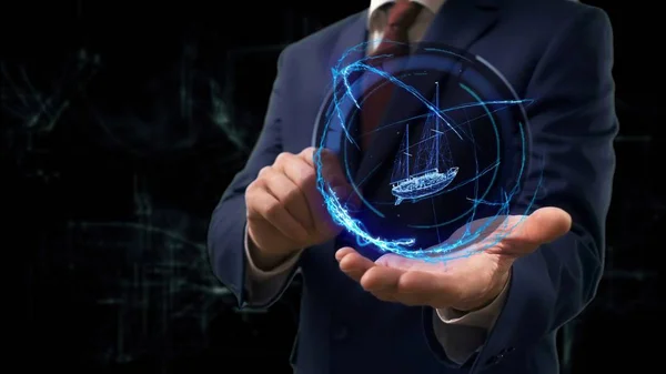İşadamı kavramı hologram 3d yelkenli gemi elini üzerinde gösterir.
