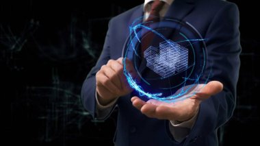 İşadamı kavramı hologram 3d para elinde gösterir.