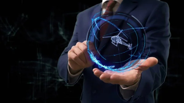 Empresario muestra concepto holograma 3d helicóptero en su mano —  Fotos de Stock