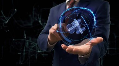 İşadamı kavramı hologram 3d dumbbells elini üzerinde gösterir