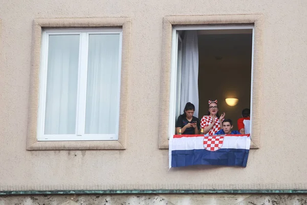 stock image ZAGREB, CROATIA - JULY 15, 2018 : Croatian football fans support national team before and during the World Cup 2018 FIFA, Final game, France vs. Croatia on Ban Jelacic Square in Zagreb, Croatia.