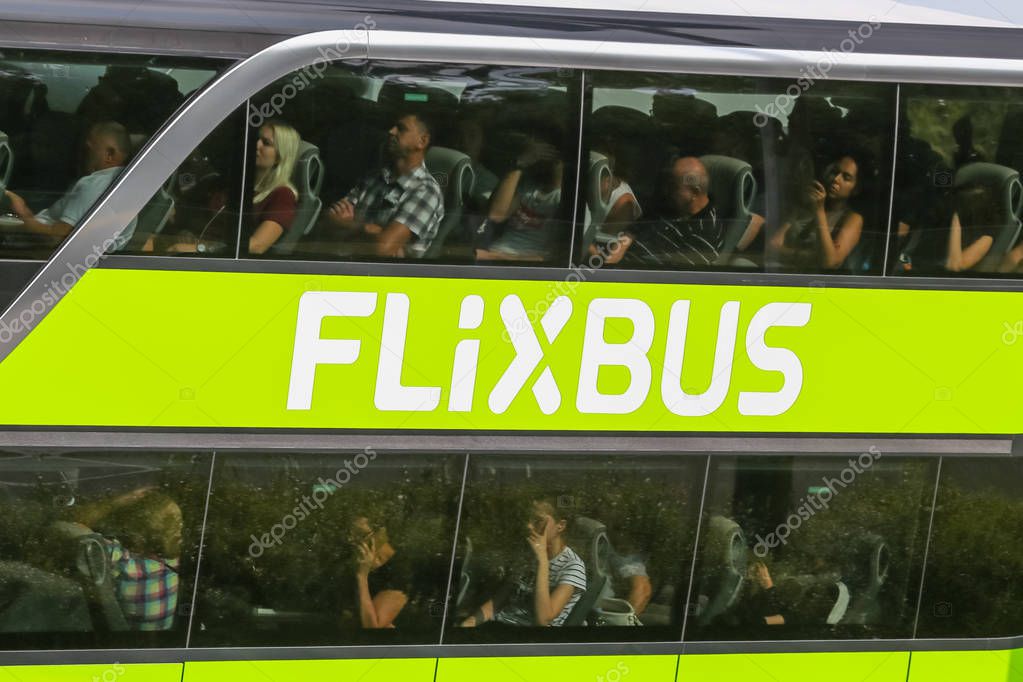 Zagreb, Croatia - August 11th,2018 :Green bus of Flixbus company stuck in traffic jam due to the large number of tourists going to the sea coast of Croatia in the Lucko highway toll in Zagreb,Croatia.