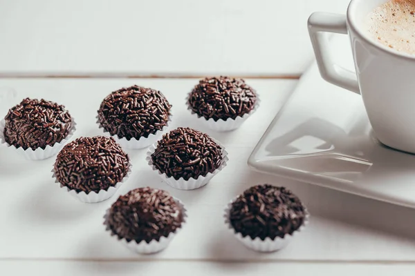 Traditional Brazilian chocolate candy called brigadeiro in coffee gourmet version