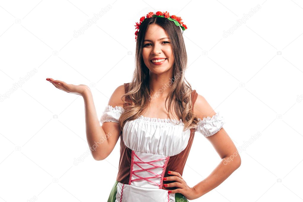 Bavarian woman celebrating the oktoberfest isolated on white background