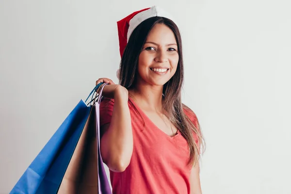 Young Woman Santa Hat Shopping Bags White Background — Stock Photo, Image