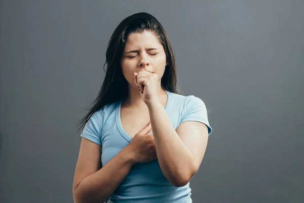 Woman Coughing Her Fist Isolated Gray Background — Stock Photo, Image