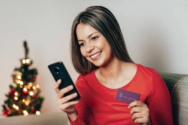 Women Holding Smart Phone Credit Card Christmas Shopping Online Home — Stock Photo, Image
