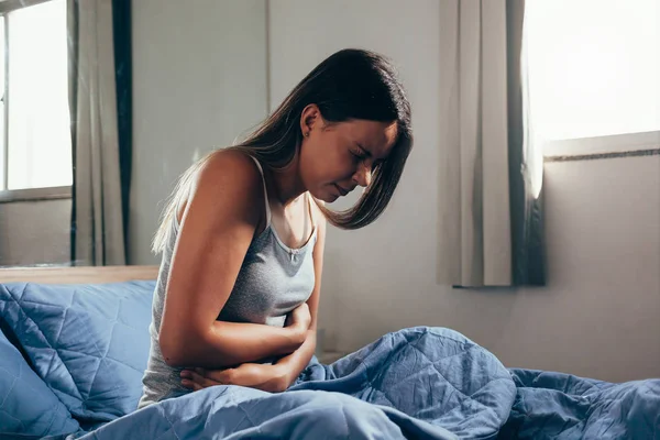 Young Woman Pajamas Grabbing Her Belly While Suffering Stomachache Her — Stock Photo, Image