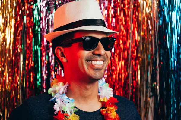 Brazilian Carnival. Young man in costume enjoying the carnival party