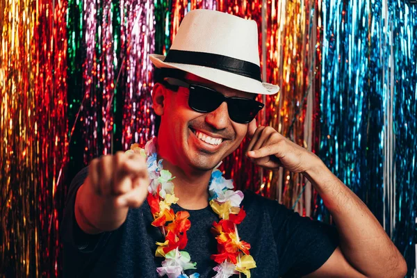 Brazilian Carnival. Young man in costume enjoying the carnival party