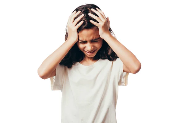 Portrait of an annoyed girl suffering from a headache isolated over white background — Stock Photo, Image