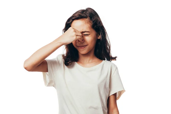 Sinus pain, sinus pressure, sinusitis. Sad child holding her nose and head because sinus pain — Stock Photo, Image