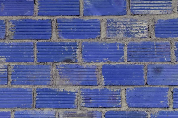 Blue brick wall. Original design background.
