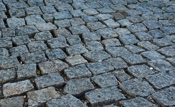 Siyah Arnavut Kaldırımlı Taş Yol Arka Plan Siyah Veya Koyu — Stok fotoğraf