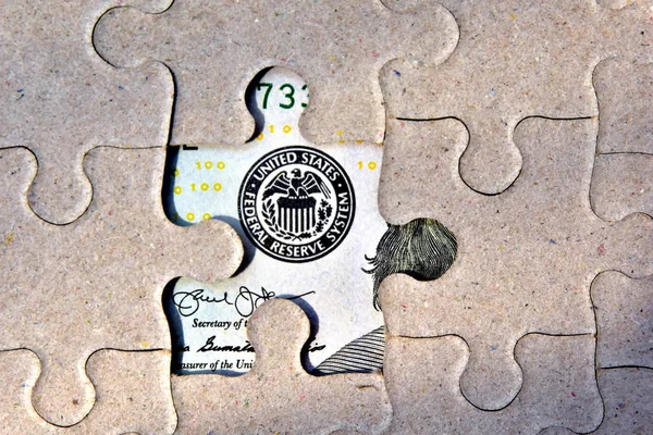 Federal Reserve System logo of the United States from scratch details of the puzzle. Copy space for your text. Can be used as the original background