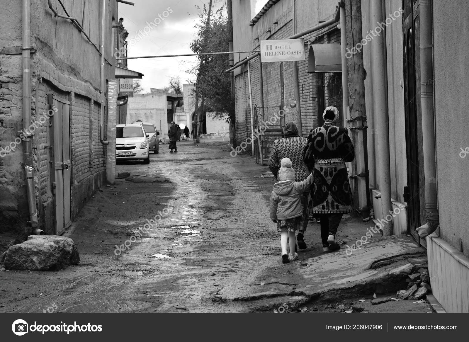 January 2018 bukhara uzbekistan woman girl walking alleyway old city stock photo