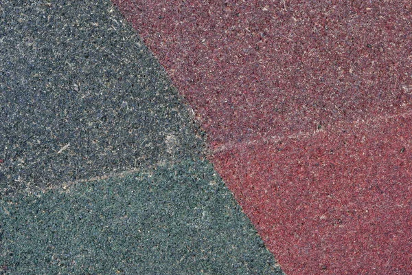不同颜色橡胶屑在操场上的接缝复合涂层 — 图库照片