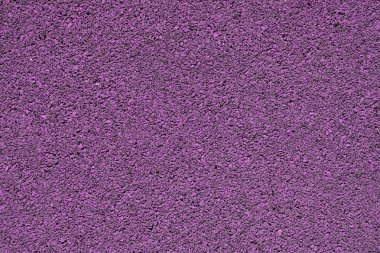 Renkli kauçuk kaplama mor arka plan görüntüsü. Yıpranmış spor alan kapak
