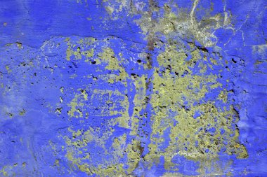 Kaba düzensiz beton yüzeyine kısmen mavi boyanır. Özgün tasarım arka plan.